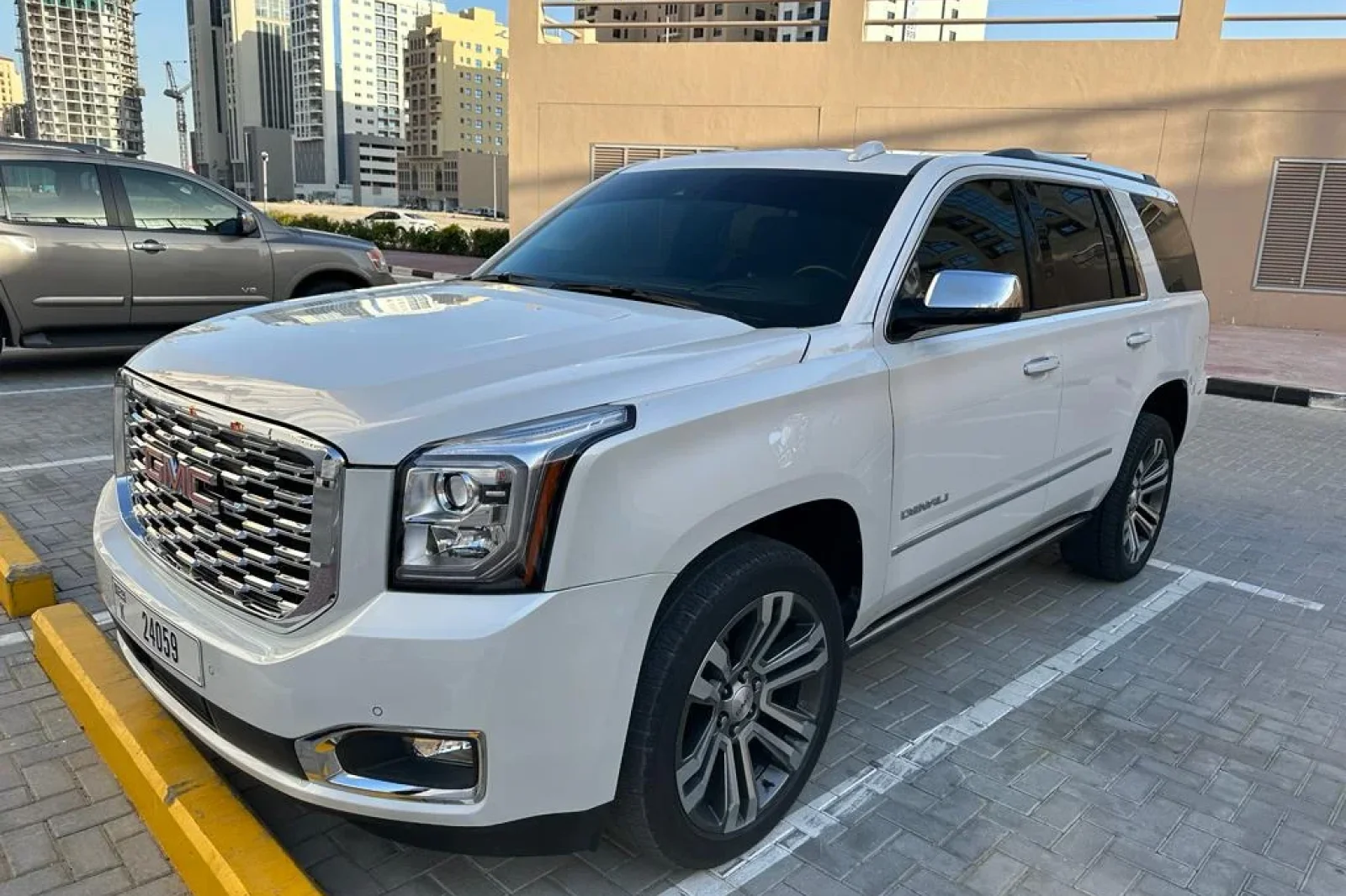 Rent GMC Yukon Denali White 2020 in Dubai