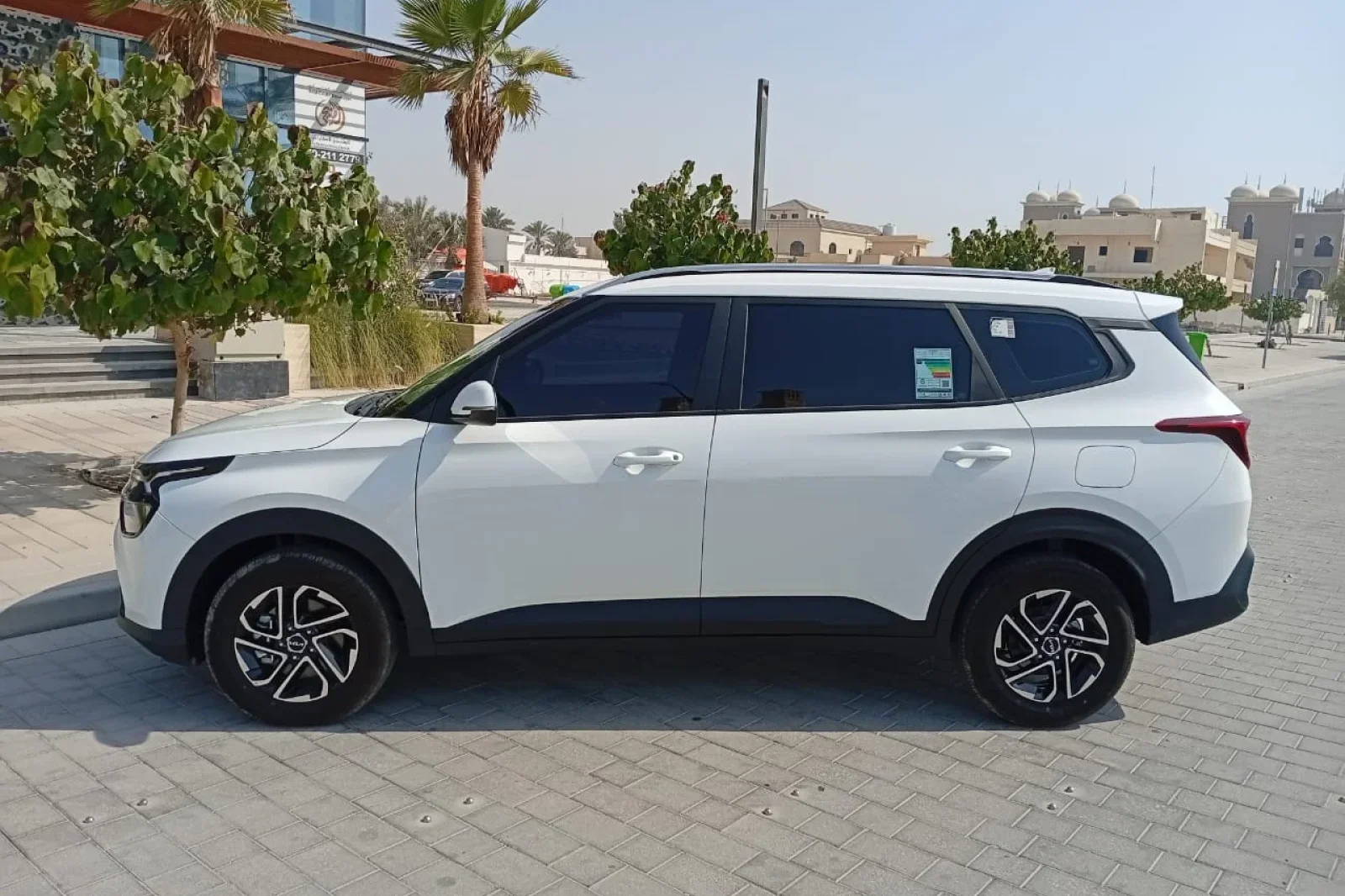 Rent Kia Carens  White 2025 in Dubai - 6 