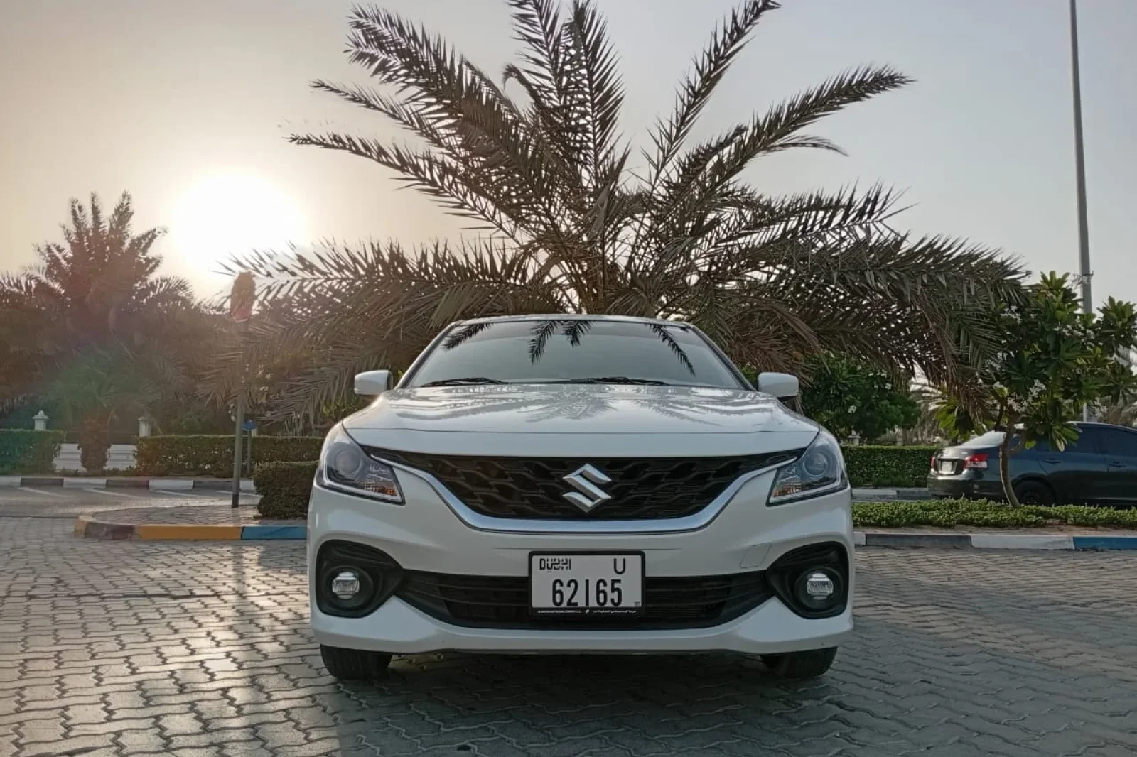 Kiralık Suzuki Baleno  Beyaz 2025 içinde Dubai - 7 