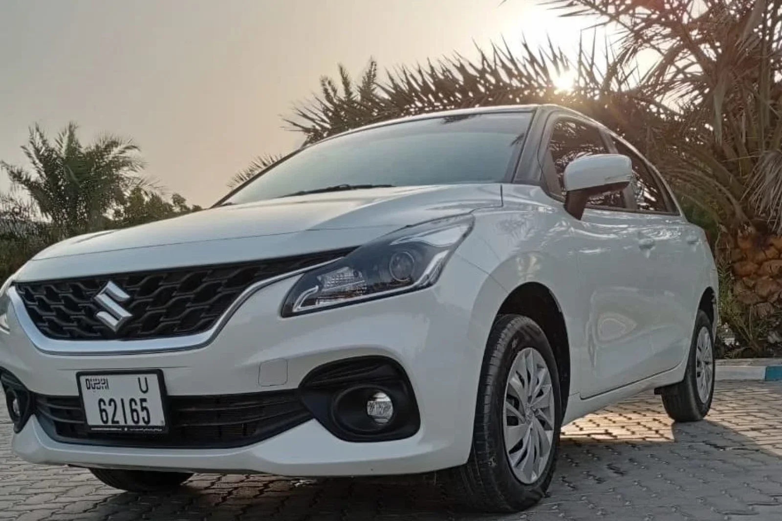 Rent Suzuki Baleno  White 2025 in Dubai