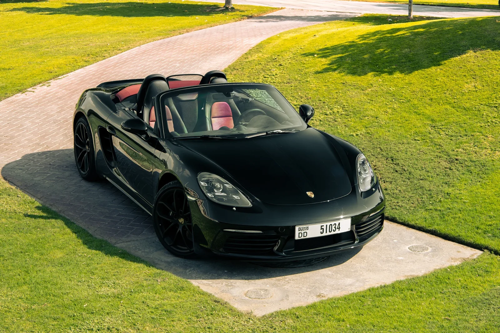 Rent Porsche Boxster  Black 2024 in Dubai - 11 