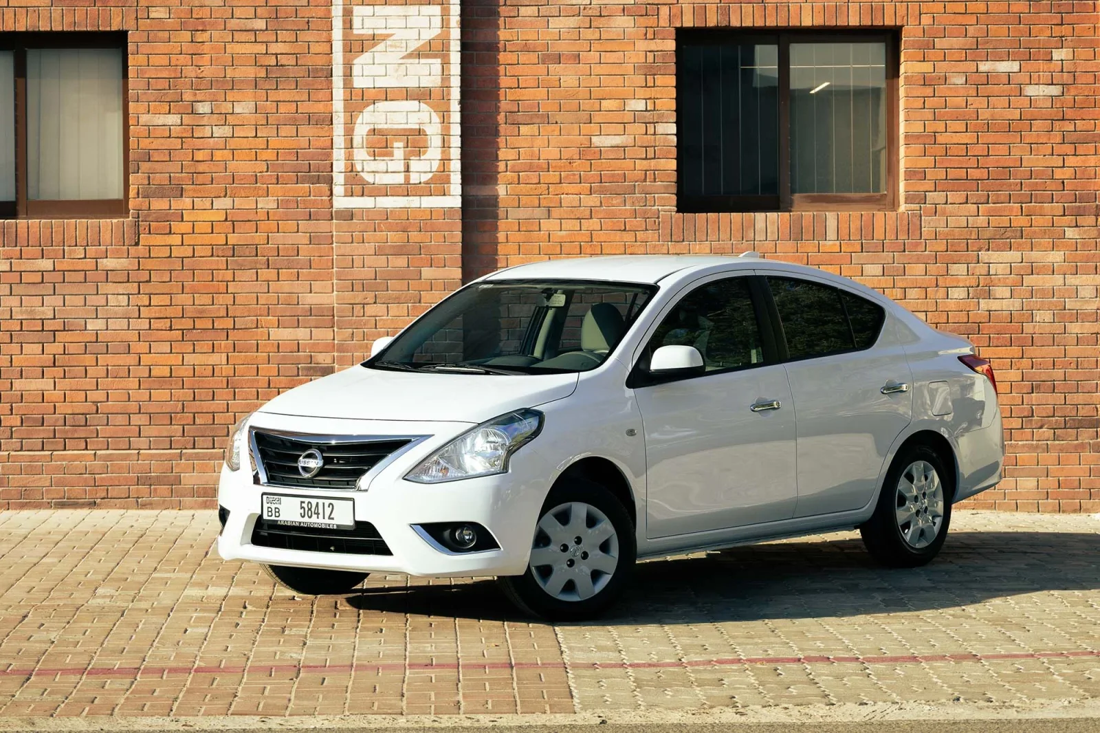 Rent Nissan Sunny  White 2026 in Dubai - 2 