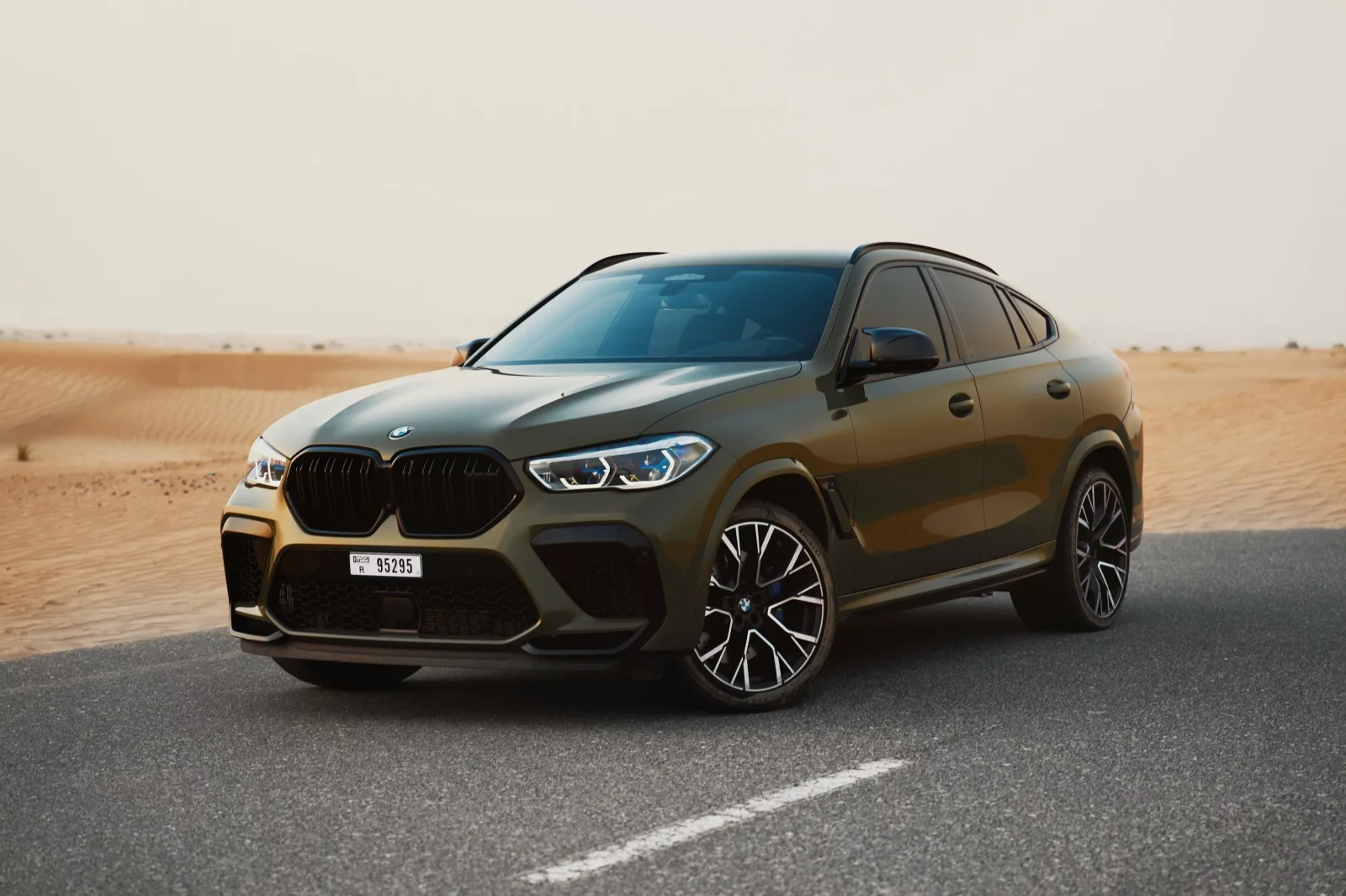 Rent BMW X6M Competition Green 2022 in Dubai