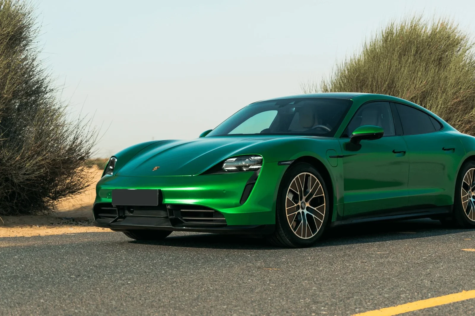 Rent Porsche Taycan Turbo S Green 2021 in Dubai