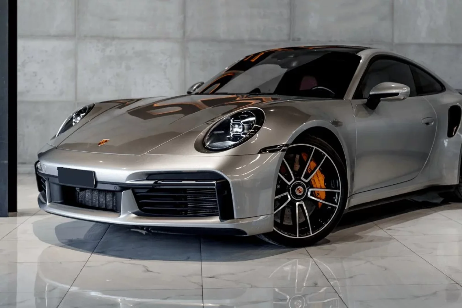 Rent Porsche 911 Turbo S Silver 2022 in Dubai