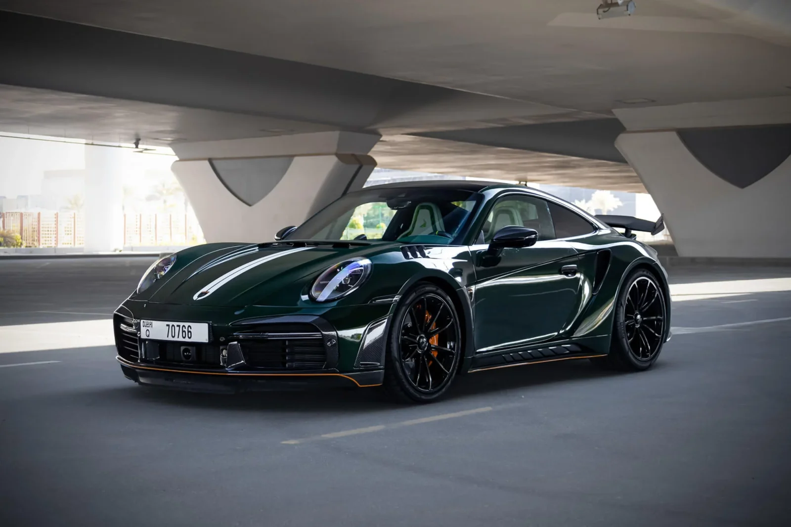 Rent Porsche 911 Stinger GTR 1/7 carbon Green 2021 in Dubai