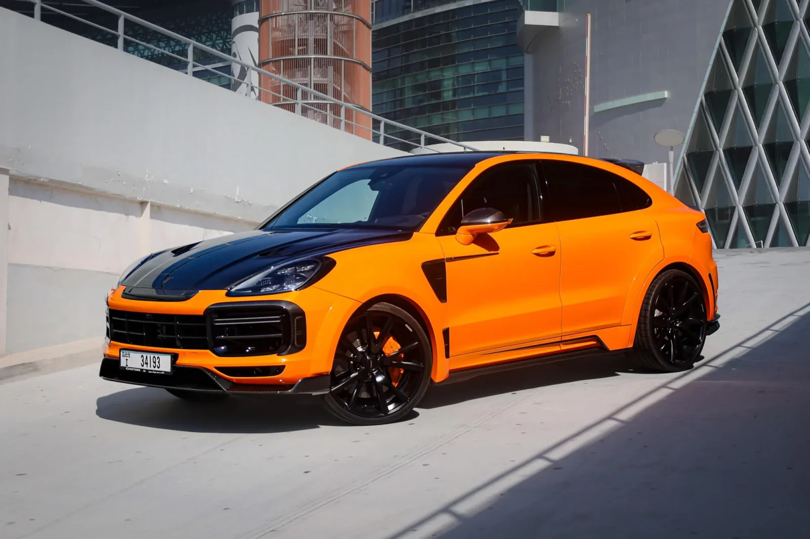 Rent Porsche Cayenne Mansory Orange 2020 in Dubai